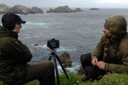 Richard and Ruth shooting Muckle Flugga Lighthouse - iPhone image by Brydon Thomason.